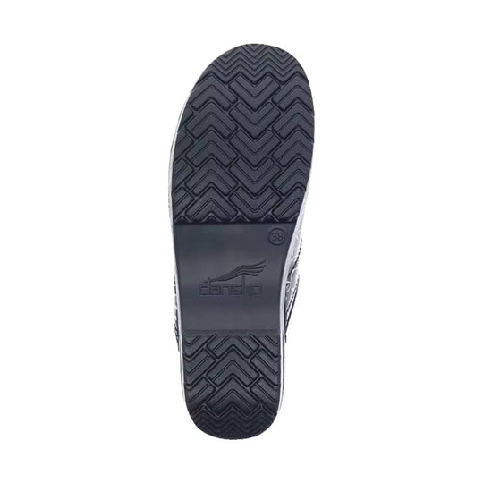 Black shoe outsole with chevron tread and embossed Dansko logo