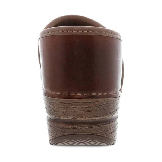 Brown leather clog heel with wood-textured midsole and rubber tread, rear view