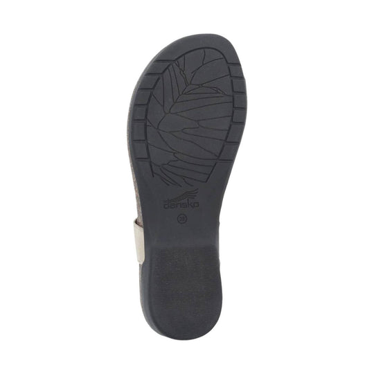 Black sandal sole with tread pattern and Dansko logo