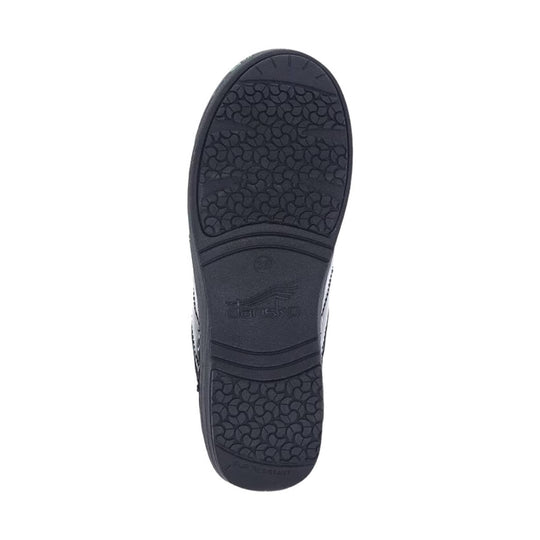 Black shoe outsole with textured tread and embossed dansko branding