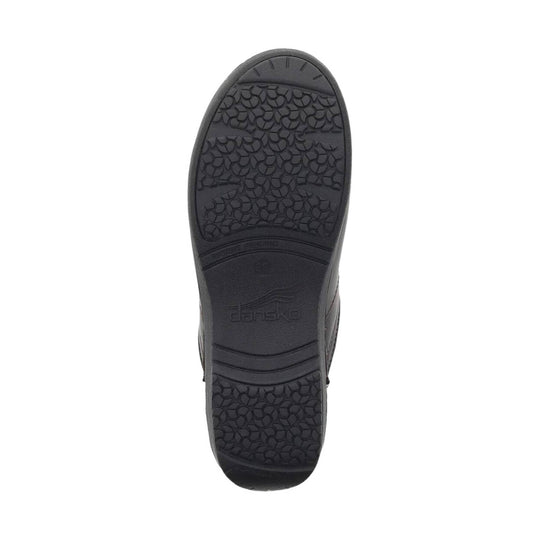 Black shoe outsole with textured tread and embossed Dansko logo