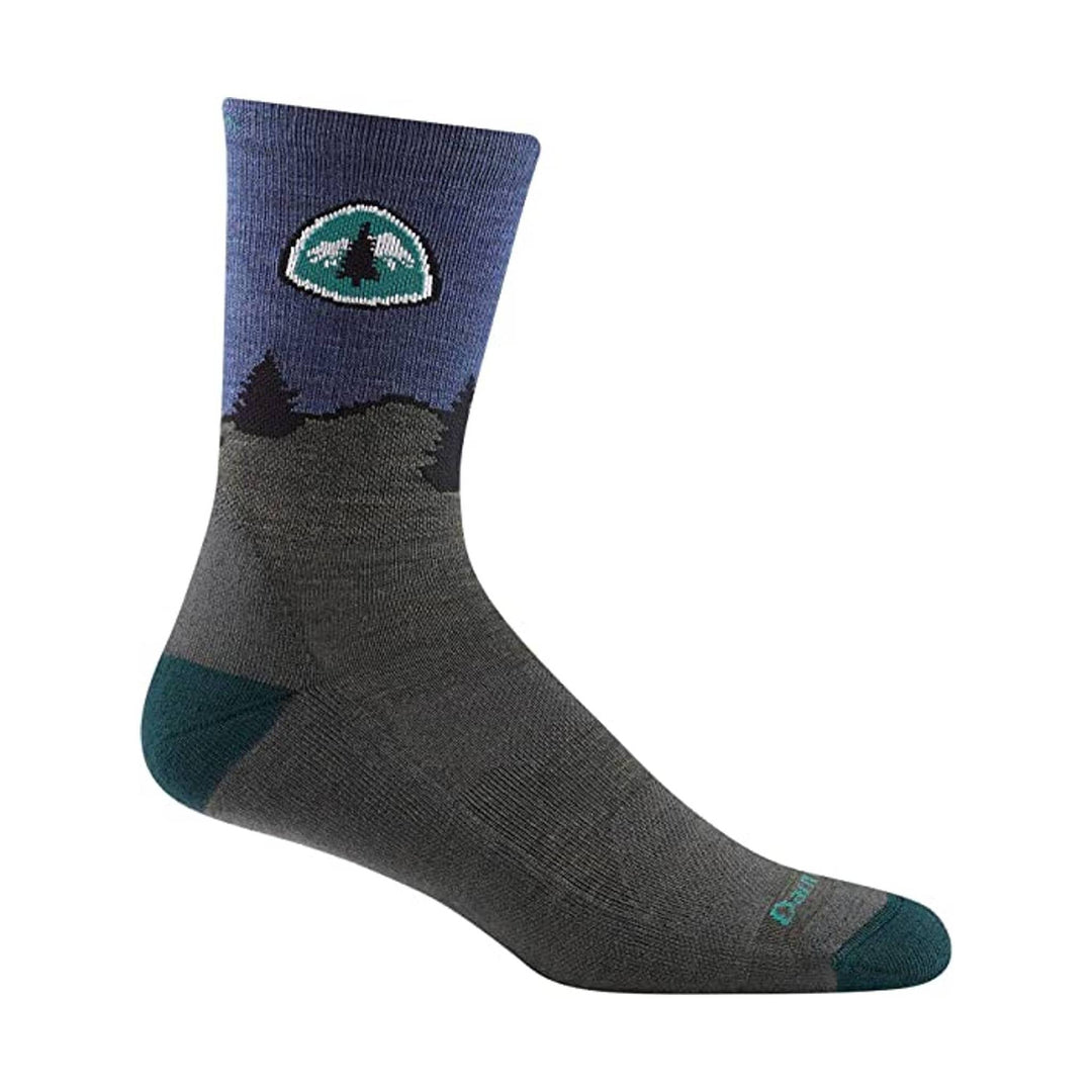 Mid-calf hiking sock with blue cuff, dark gray body, teal toe and heel, and mountain patch near the top