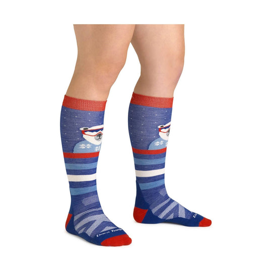 Blue over-the-calf kids socks with red cuffs, toes, and heels, plus a polar bear graphic