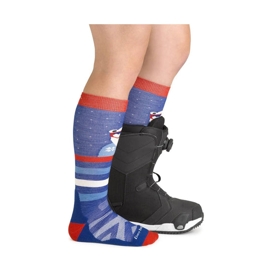 Blue and red over-the-calf sock worn with a black snowboard boot