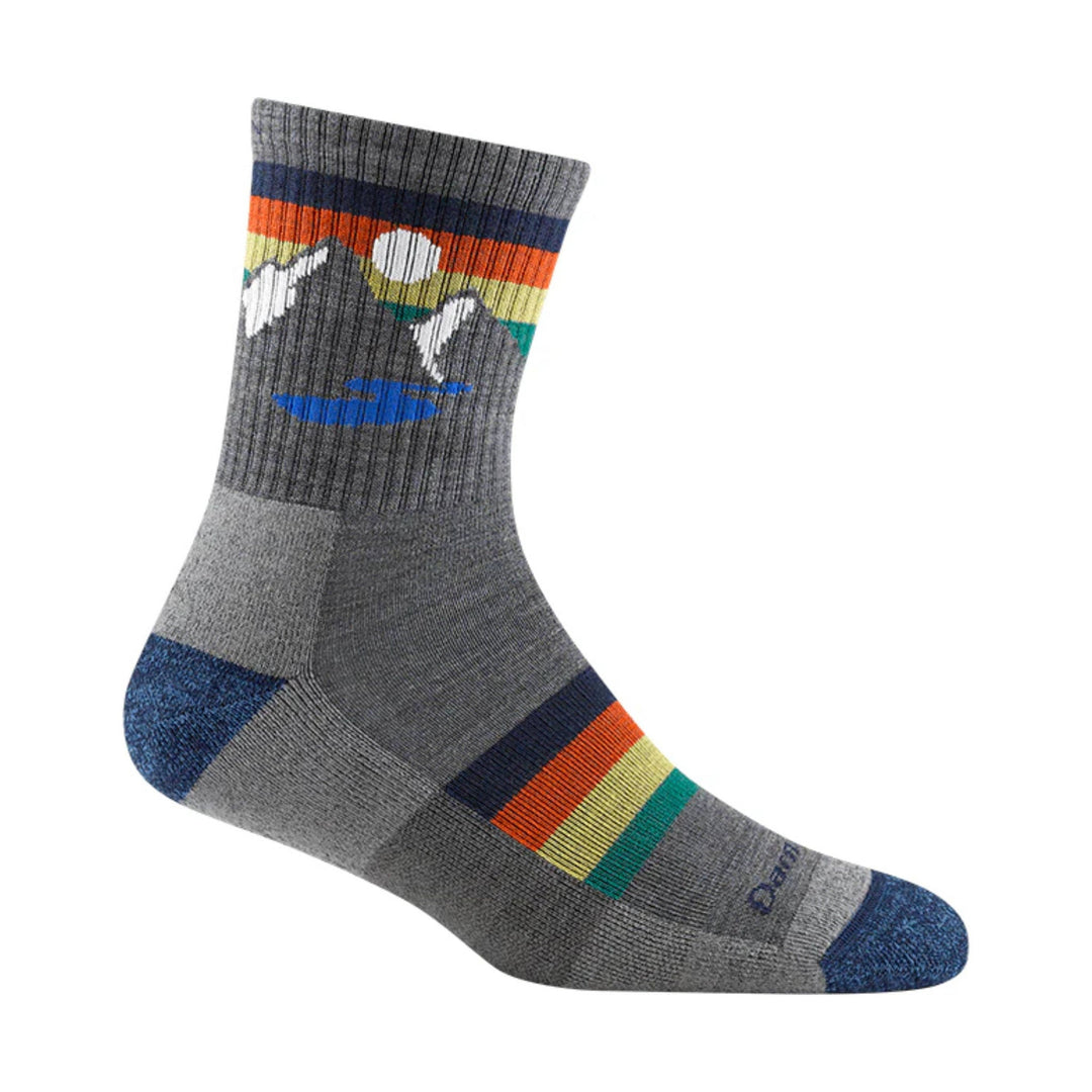 Gray hiking sock with mountain and sunrise graphic, color stripes, and blue heel and toe accents
