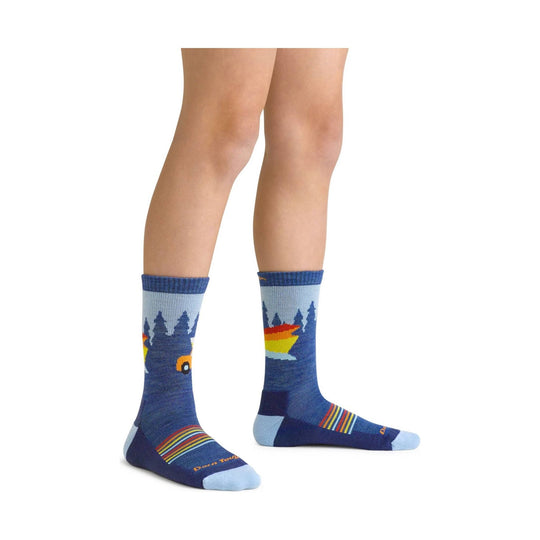 Blue crew hiking socks with rainbow stripes and a tree-and-bear pattern