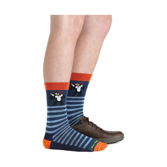 Blue and orange striped crew socks with a black-and-white animal graphic