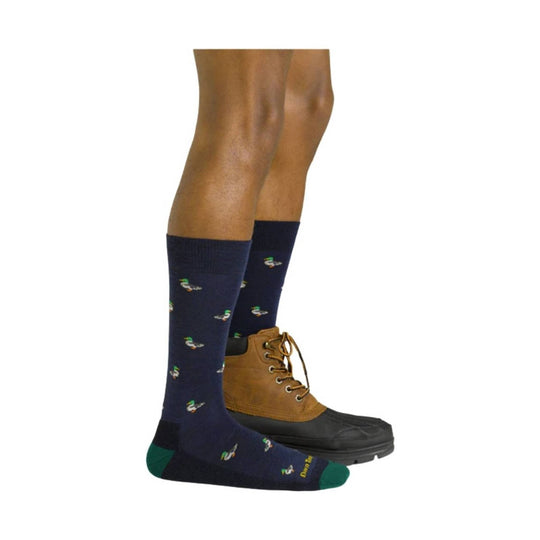Navy crew socks with small duck motifs worn with tan lace-up hiking boots