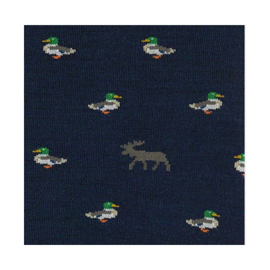 Navy knit sock with small duck pattern and a central moose motif