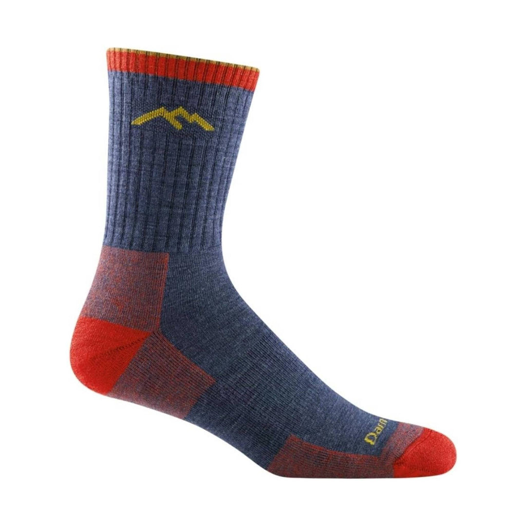 Blue crew hiking sock with red heel and toe accents and a yellow mountain logo near the top