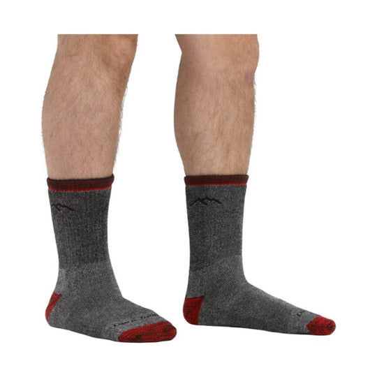 Gray crew socks with red heel, toe, and cuff accents shown on a model's lower legs