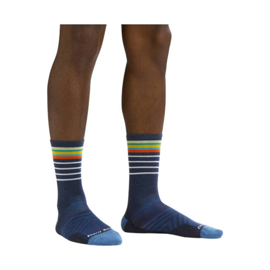 Navy crew socks with multicolor striped cuffs and blue toe and heel