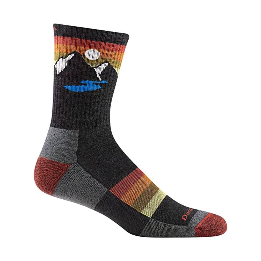 Black crew sock with mountain and sunset pattern, blue accents, and gray-red heel and toe