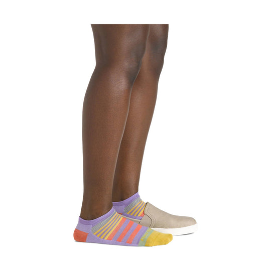 Lavender no-show socks with multicolor striped pattern, shown on a model wearing slip-on shoes