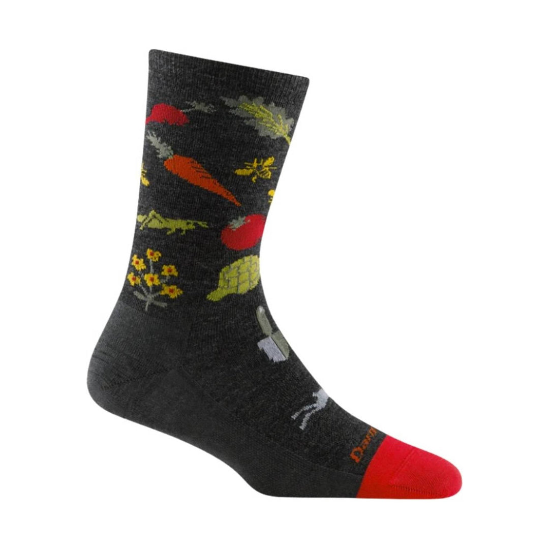 Black crew sock with colorful farm produce pattern and red heel and toe