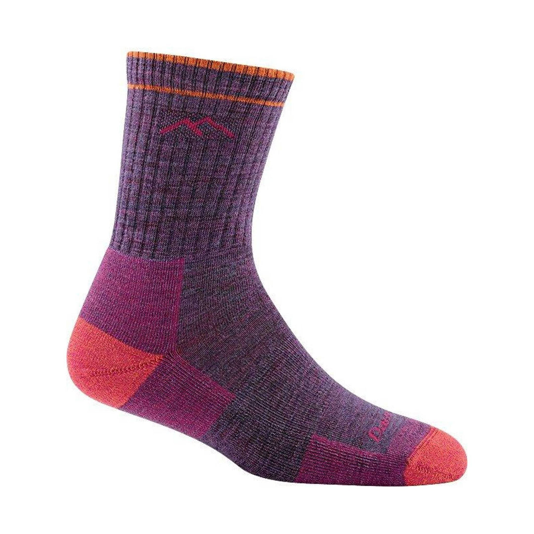 Purple and magenta patterned crew sock with orange toe and cuff accents.