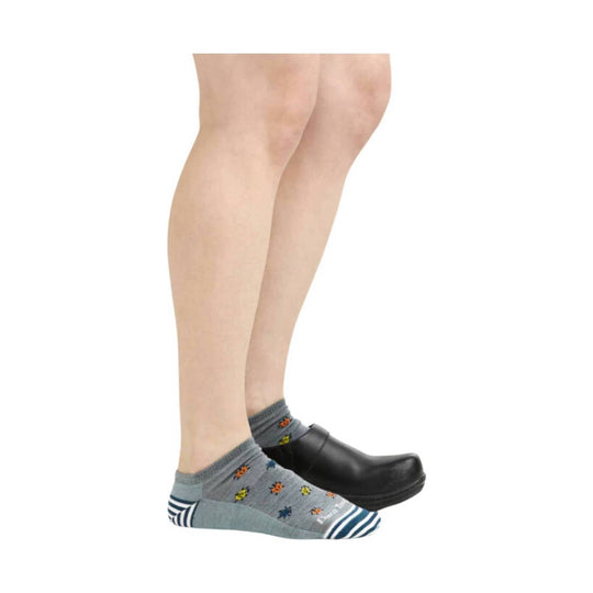 Gray no-show socks with colorful ladybug pattern and striped toe and heel, worn with black clogs