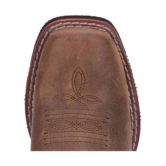 Brown leather cowboy boot toe with stitched decorative pattern and welt stitching