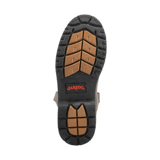 Boot outsole with black tread and tan lug inserts, viewed from below