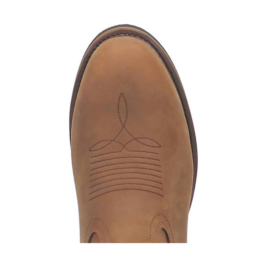 Tan western boot toe with stitched decorative pattern and dark welt