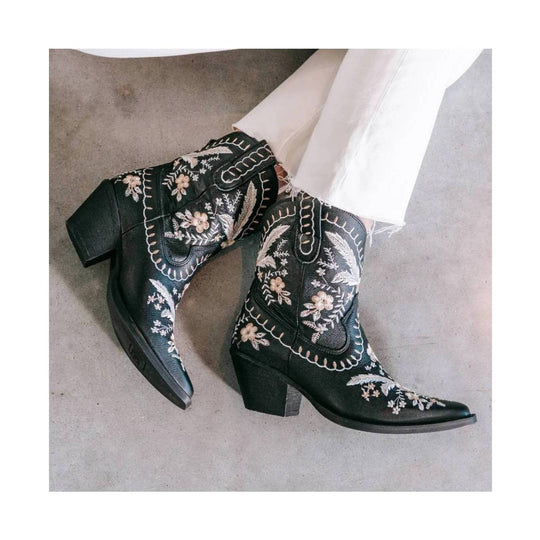 Black embroidered western ankle boots with pointed toes and block heels