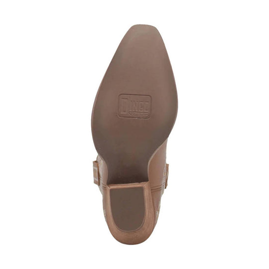 Brown boot sole viewed from below with embossed logo in the center