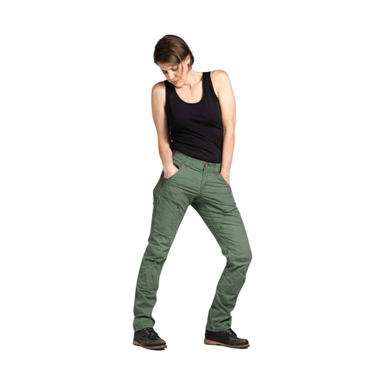 Woman wearing olive green cargo work pants with multiple pockets, black tank top, and black shoes