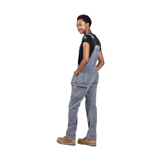 Grey denim overalls with multiple pockets, shown over a black T-shirt from the back