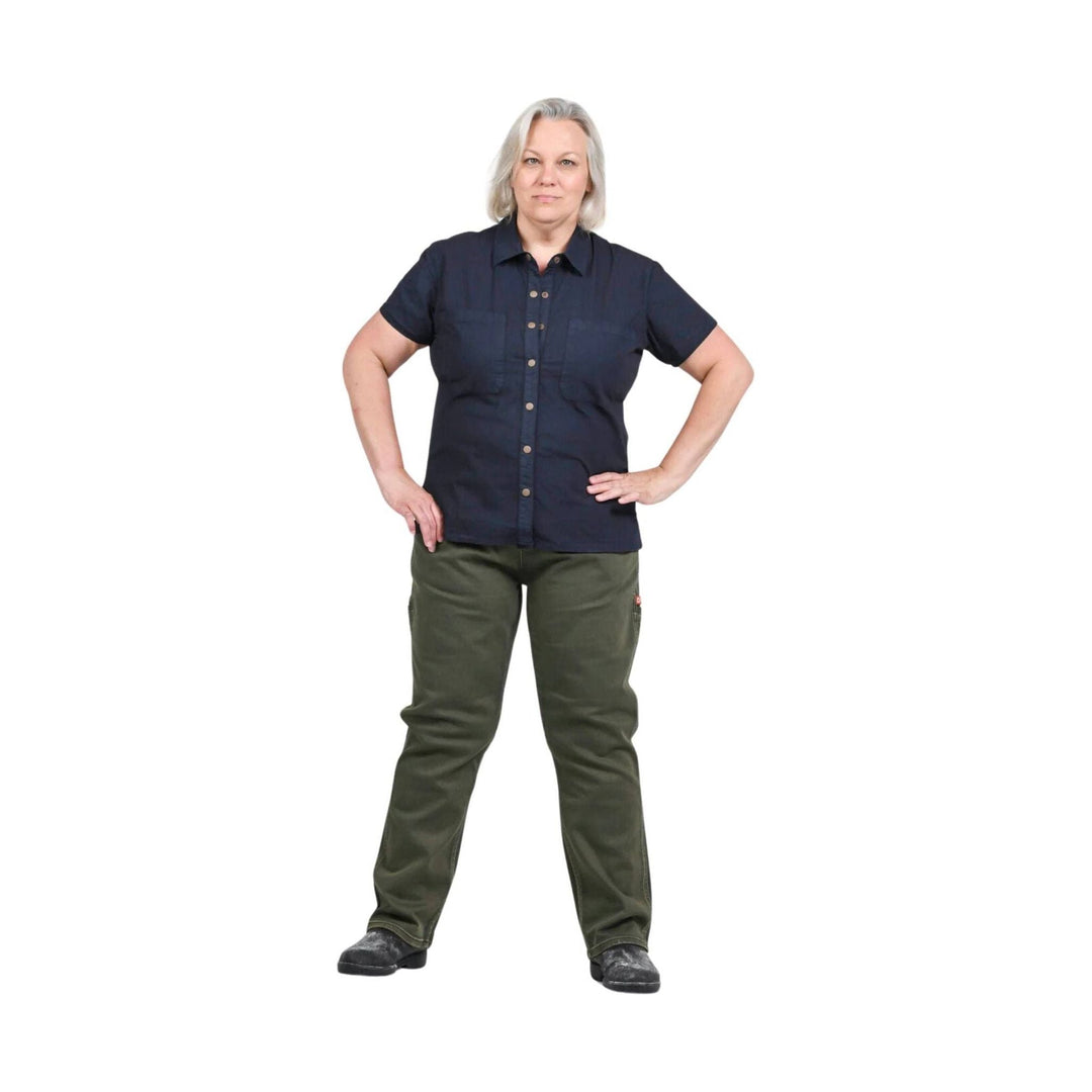 Olive green straight-leg work pants worn by a model in a navy button-up shirt