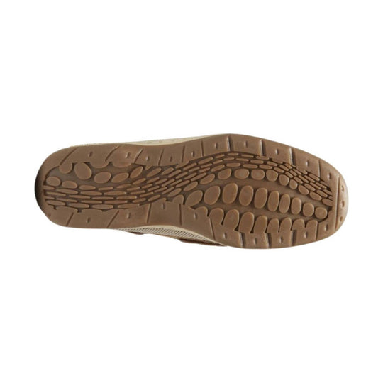 Tan shoe outsole with oval tread pattern