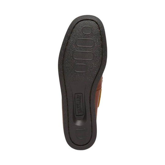 Tan leather slip-on shoe shown from the sole