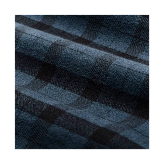 Close-up of dark blue and black plaid flannel fabric