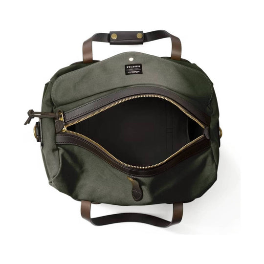 Olive green canvas duffel bag with brown leather handles and a large front zipper opening