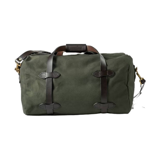 Olive canvas duffel bag with dark leather handles, straps, and brass hardware