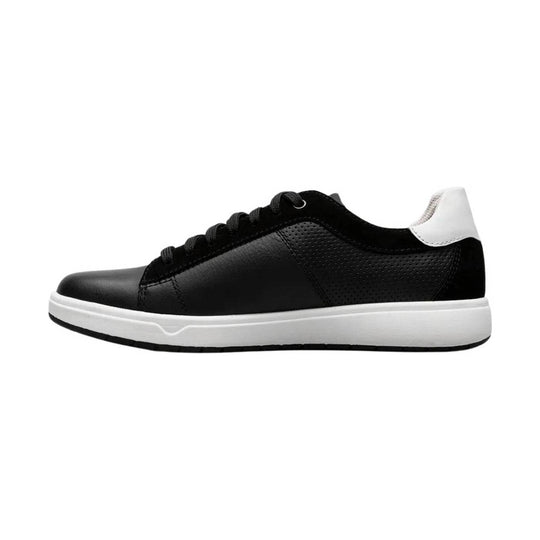 Black low-top sneaker with black laces, white midsole, and white heel tab
