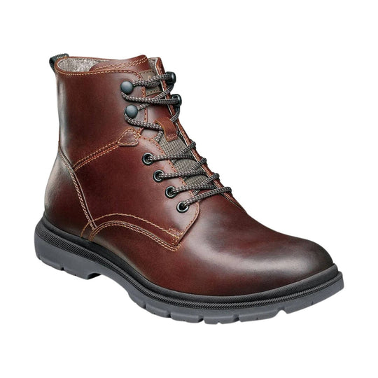 Brown leather lace-up ankle boot with black sole and hiking-style laces