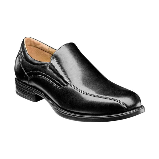 Black leather slip-on dress shoe with a low heel and stitched detailing