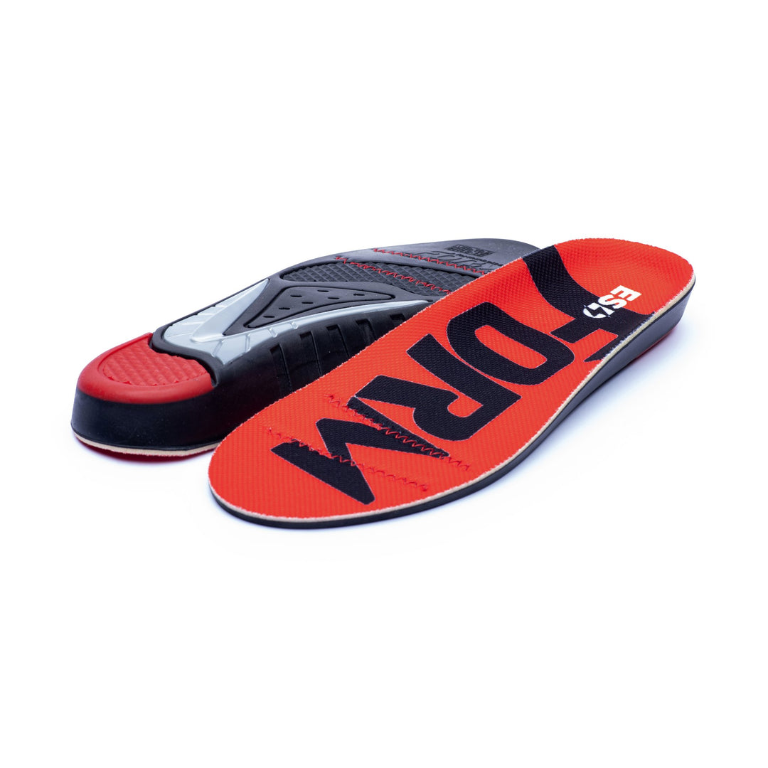 Red and black shoe insole with molded black support and visible VIBRAM text