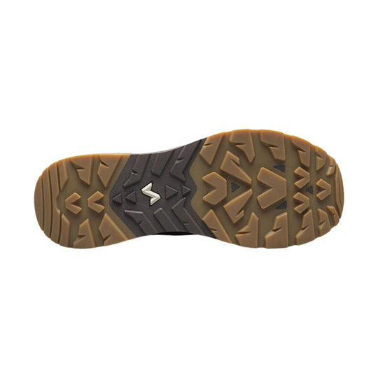 Boot outsole in brown and dark gray with aggressive lug tread