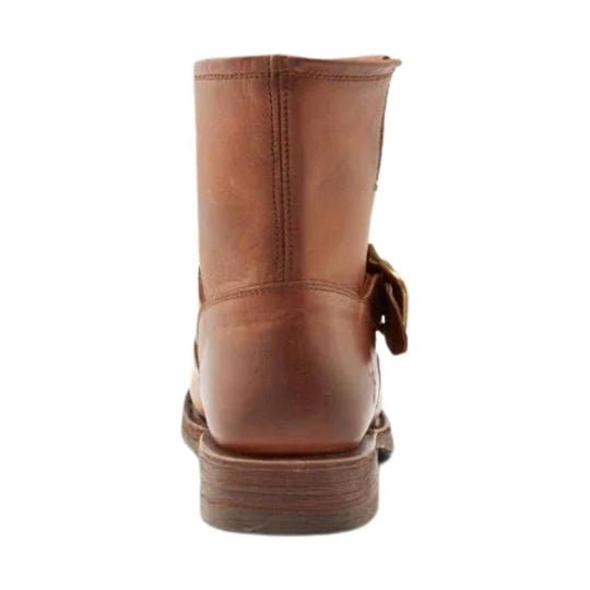 Brown leather ankle boot shown from the back with a low stacked heel and side buckle detail