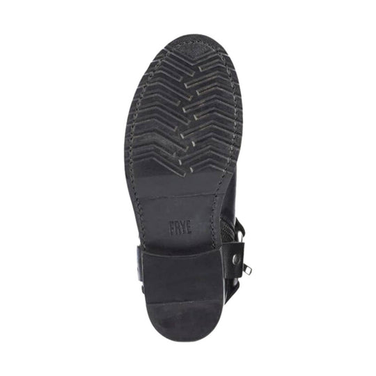 Black boot sole with herringbone tread and FRYE embossing