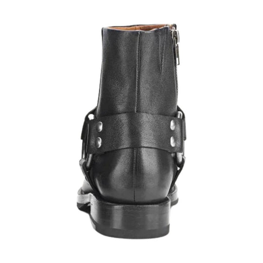 Black leather ankle boot with a harness strap, side zipper, and chunky heel