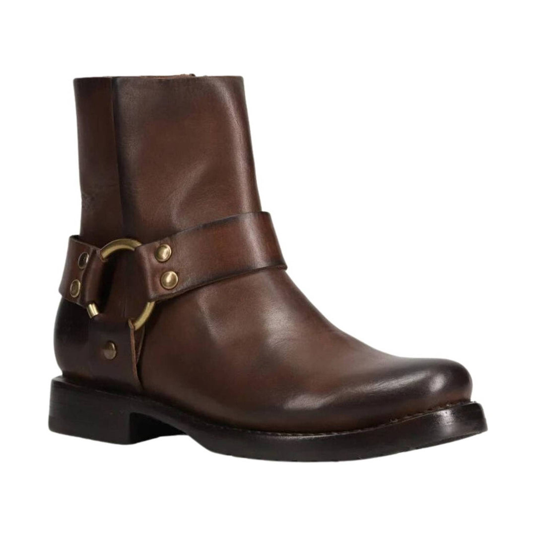 Brown leather ankle boot with a harness strap, brass ring, and low stacked heel