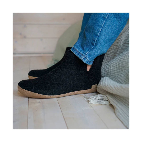 Black felt ankle boot slippers with tan leather soles