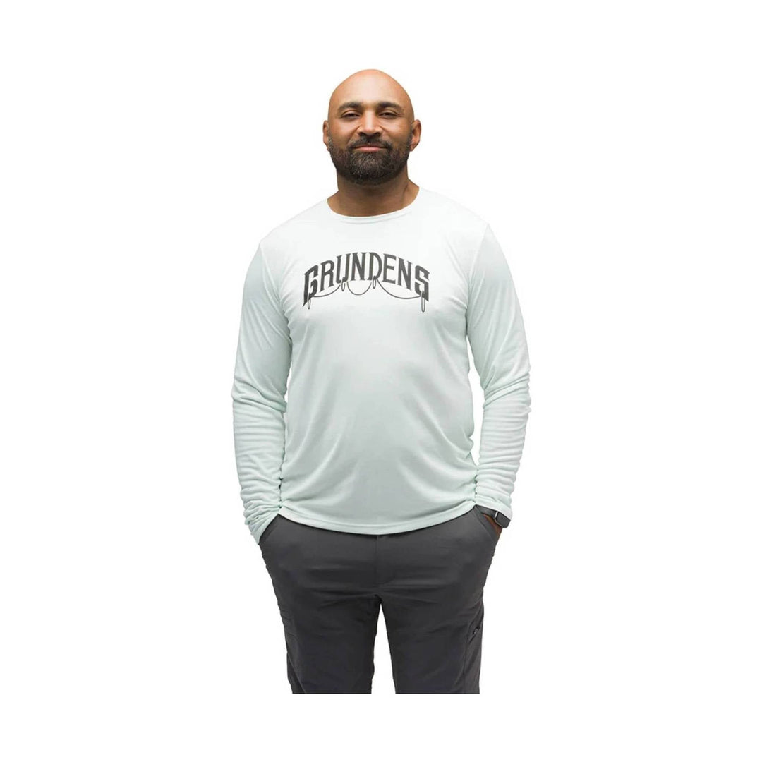 White long-sleeve performance shirt with a large GRUNDENS chest logo