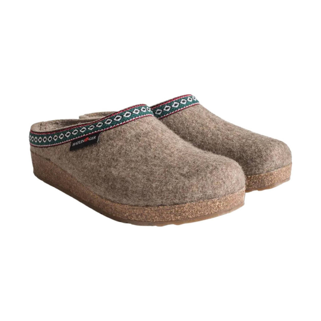 Pair of brown wool clogs with cork soles and patterned trim