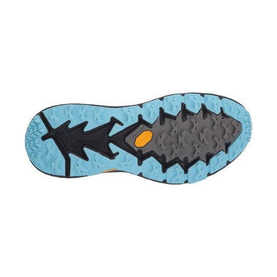 Trail shoe outsole with light blue lugs, black sections, gray center tread, and an orange Vibram insert