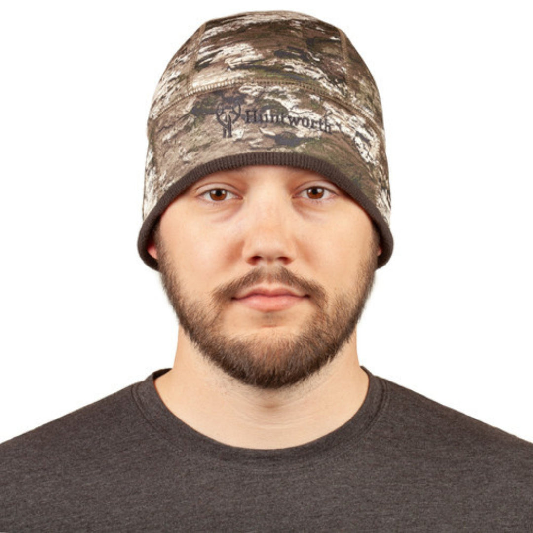 Camouflage fleece beanie with a folded cuff and small front logo text