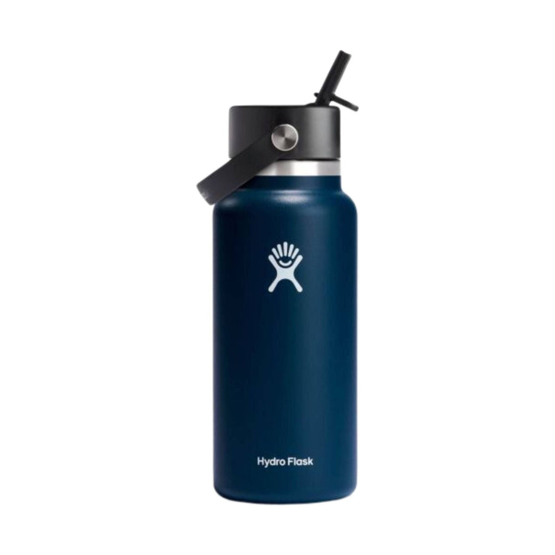 Blue stainless steel water bottle with straw lid, carry strap, and Hydro Flask logo