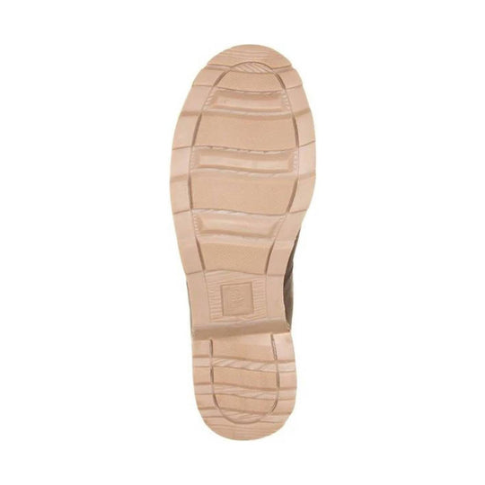 Beige boot outsole with molded tread pattern